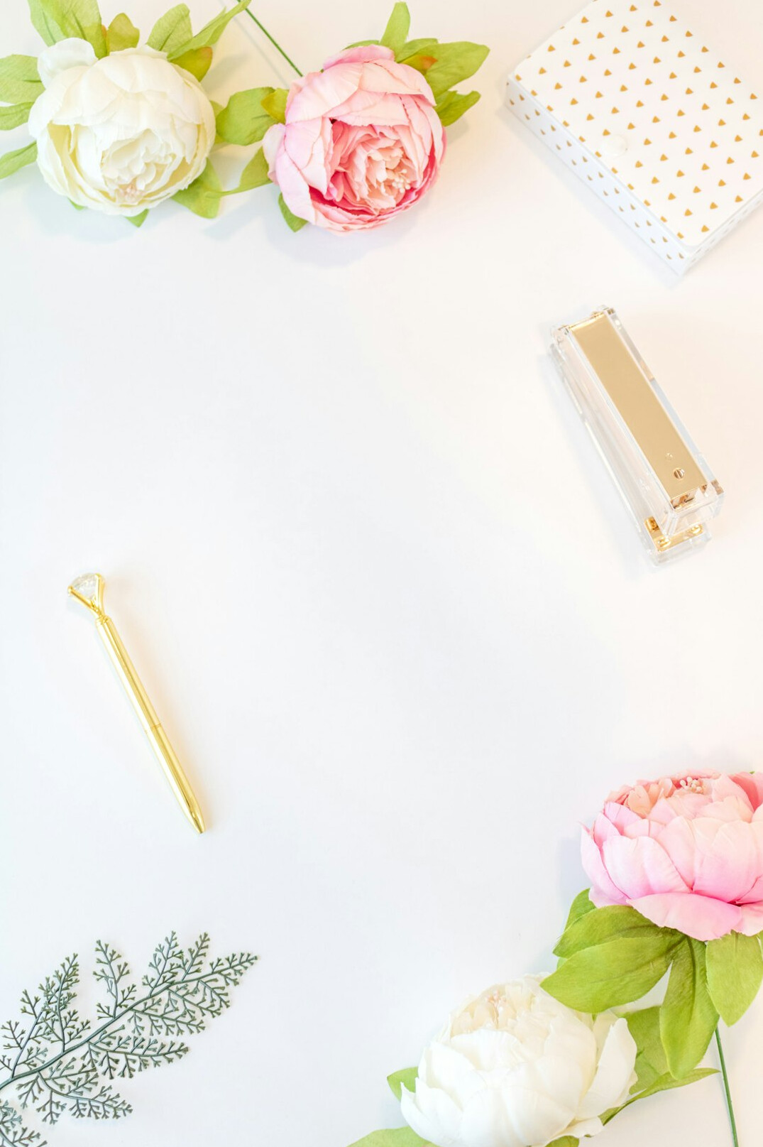Open notebook and pen on a bright desk ready for writing