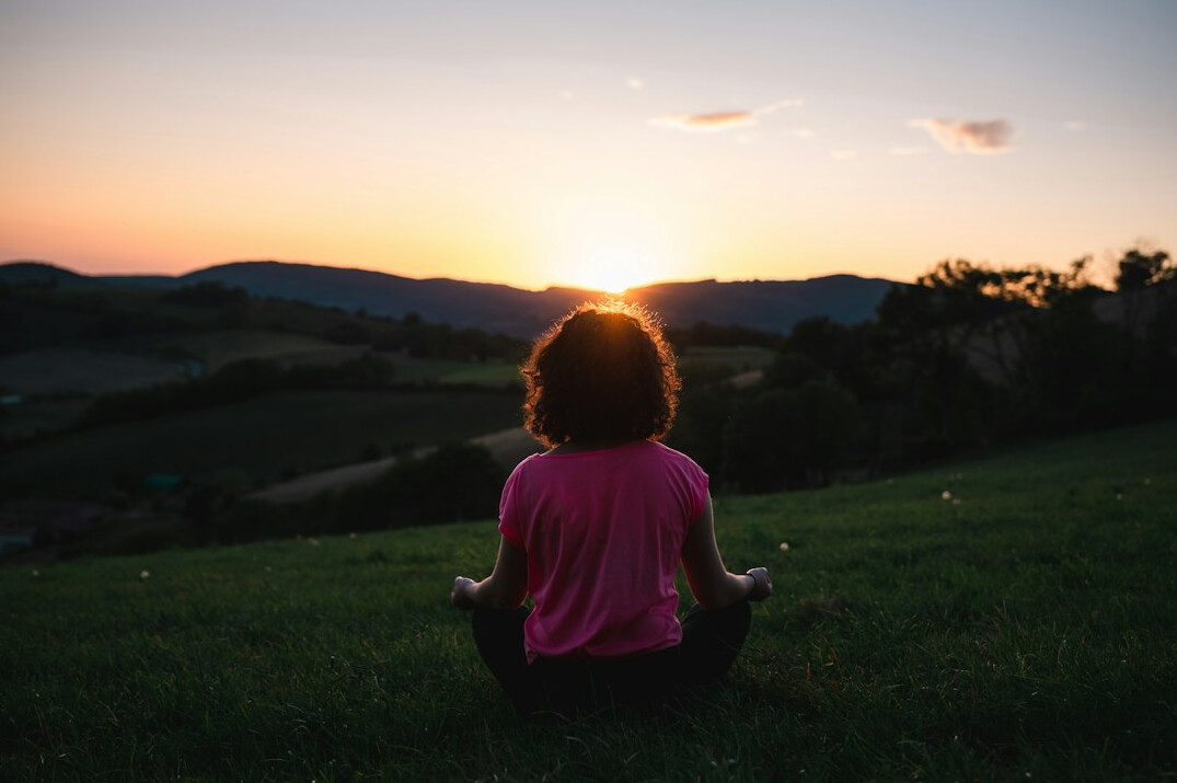 person meditating calmly