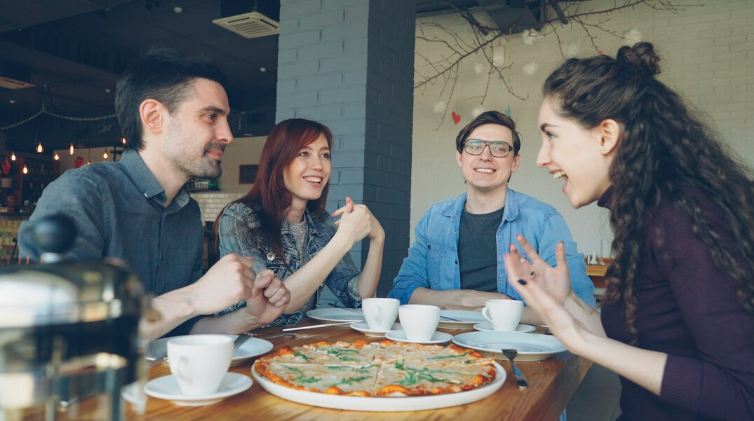 friends talking and laughing together